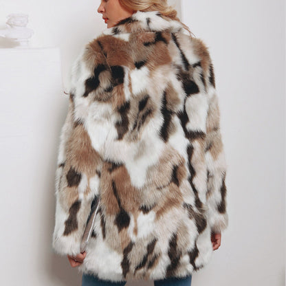 Fur coat with a pattern of white, brown, and black on a plain background