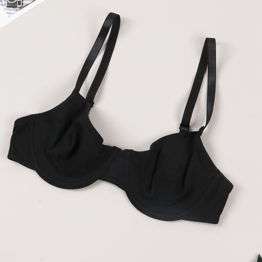 Black bra on a light gray background