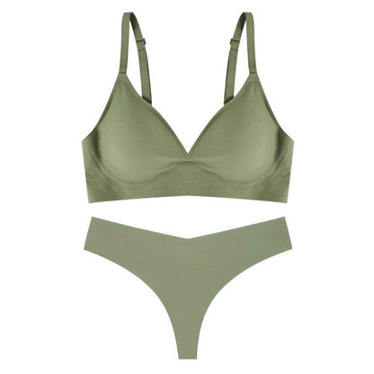 Green bra and panties set on a white background