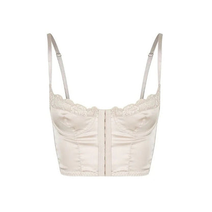 Beige lace-trimmed crop top on a white background