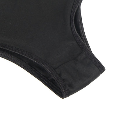 Close-up of a black swimsuit top on a white background