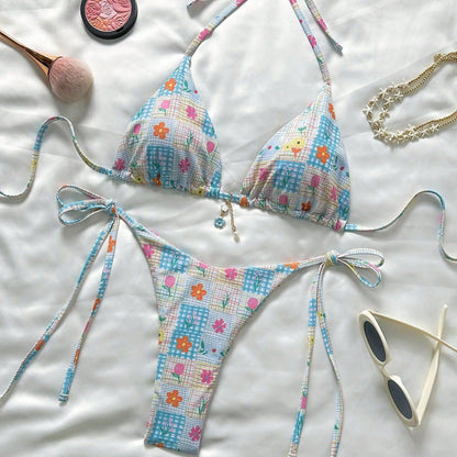 Colorful bikini set with floral pattern on a light background