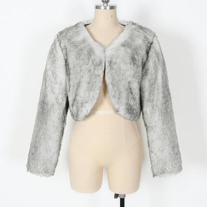 Gray fur bolero jacket on a mannequin against a white background