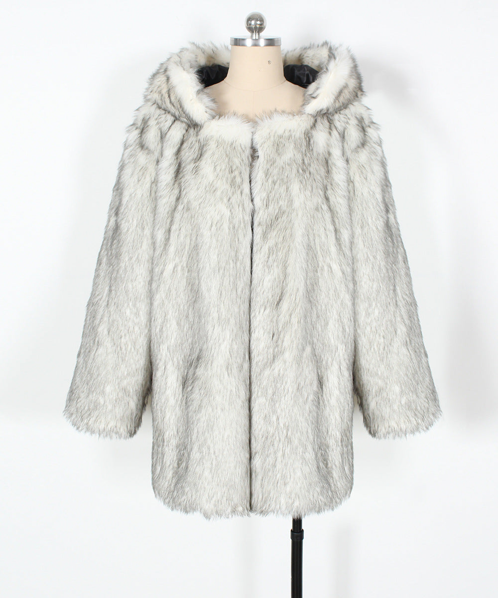 Fur coat on a mannequin against a white background