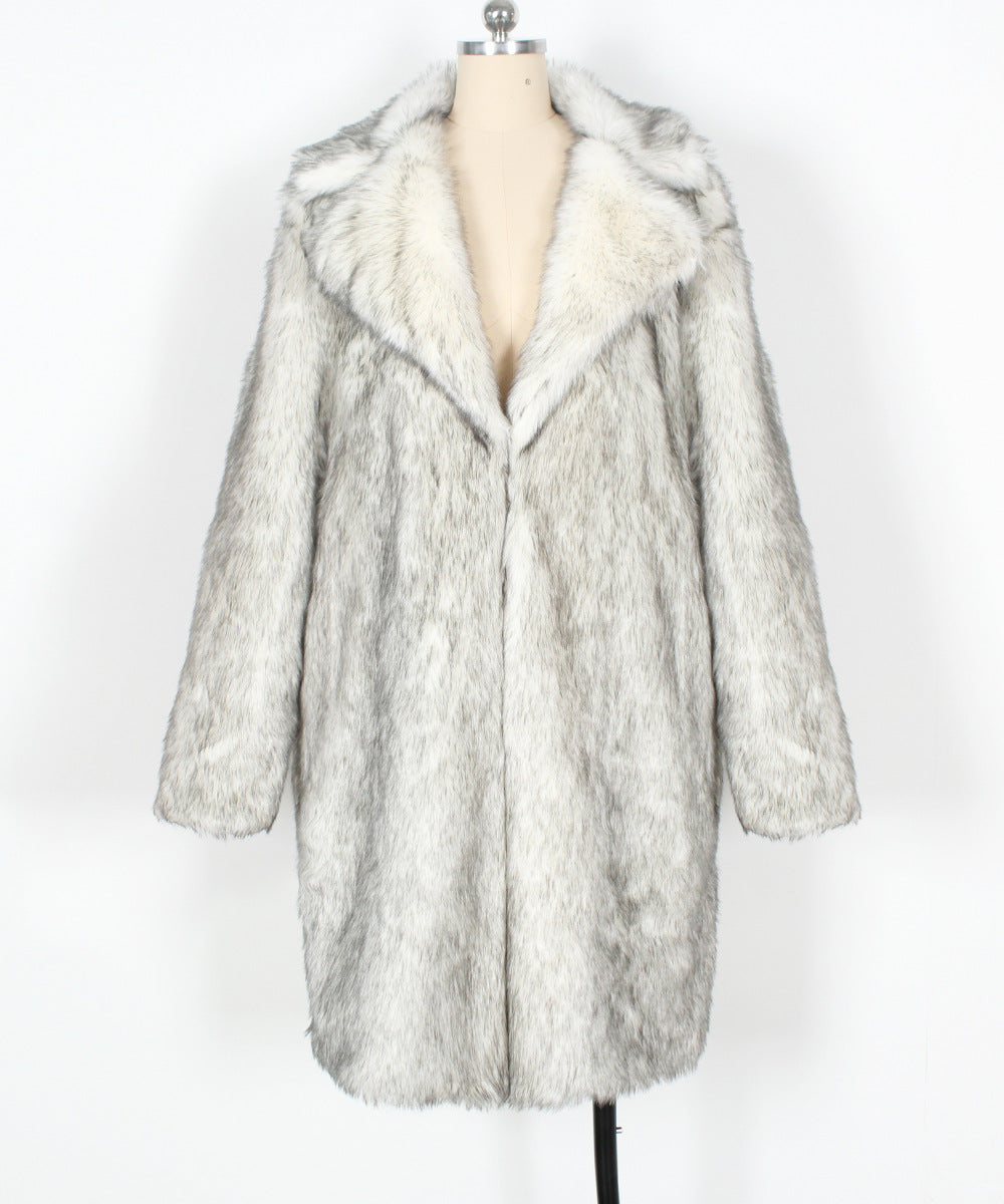Fur coat with white fur collar on a mannequin against a white background