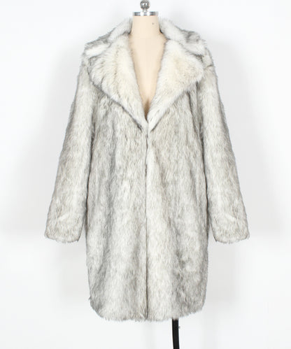 Fur coat with white fur collar on a mannequin against a white background