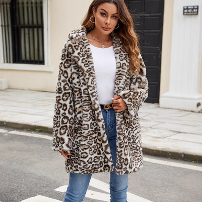 Woman wearing a leopard print coat on a city street