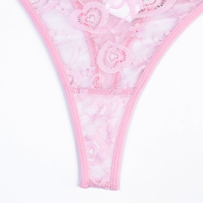 Pink lace thong on a white background