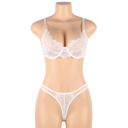 White lace lingerie set on a mannequin against a white background