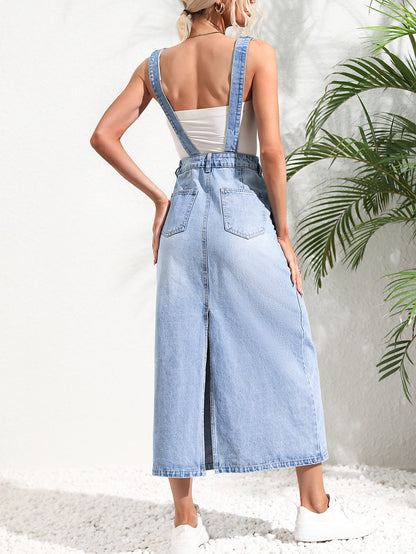Woman wearing a denim dress with a white background and green plant Women wearing tight waist strap mid-length denim dress with kurti