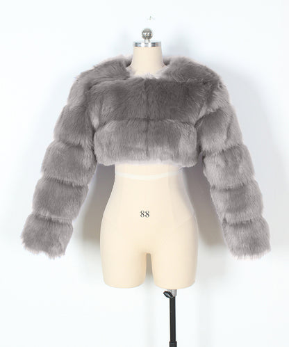 Gray fur jacket on a mannequin against a white background