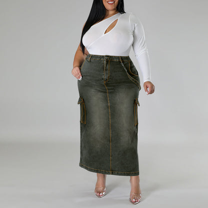 Woman wearing a white long-sleeve top and green denim skirt on a gray background plus size denim decoration sleeveless split skirt women jeans in trend