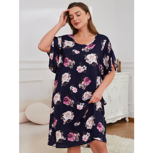 Woman wearing a floral dress in a home setting