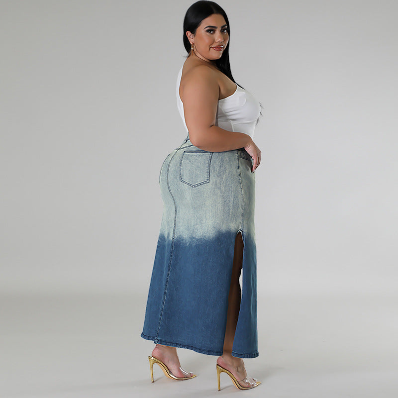 Woman wearing a long denim skirt with a gradient effect on a plain plus size denim woven gradient split skirt women jeans in trend background