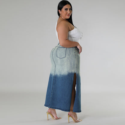 Woman wearing a long denim skirt with a gradient effect on a plain plus size denim woven gradient split skirt women jeans in trend background