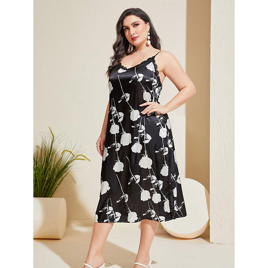 Woman wearing a black floral dress in an indoor setting