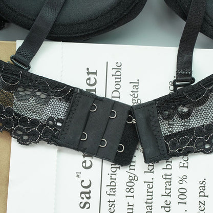 Black lace lingerie set on a newspaper background