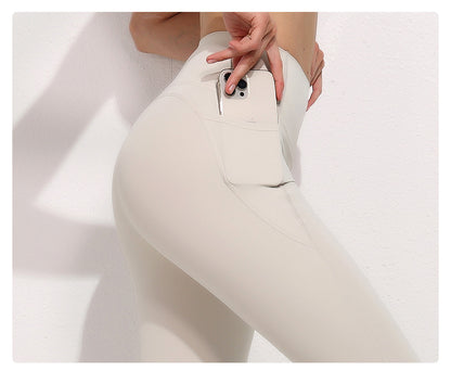 White leggings with a pocket on a white background