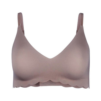 Beige bra on a white background