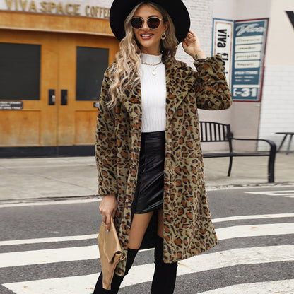 Woman wearing a leopard print coat in an urban setting