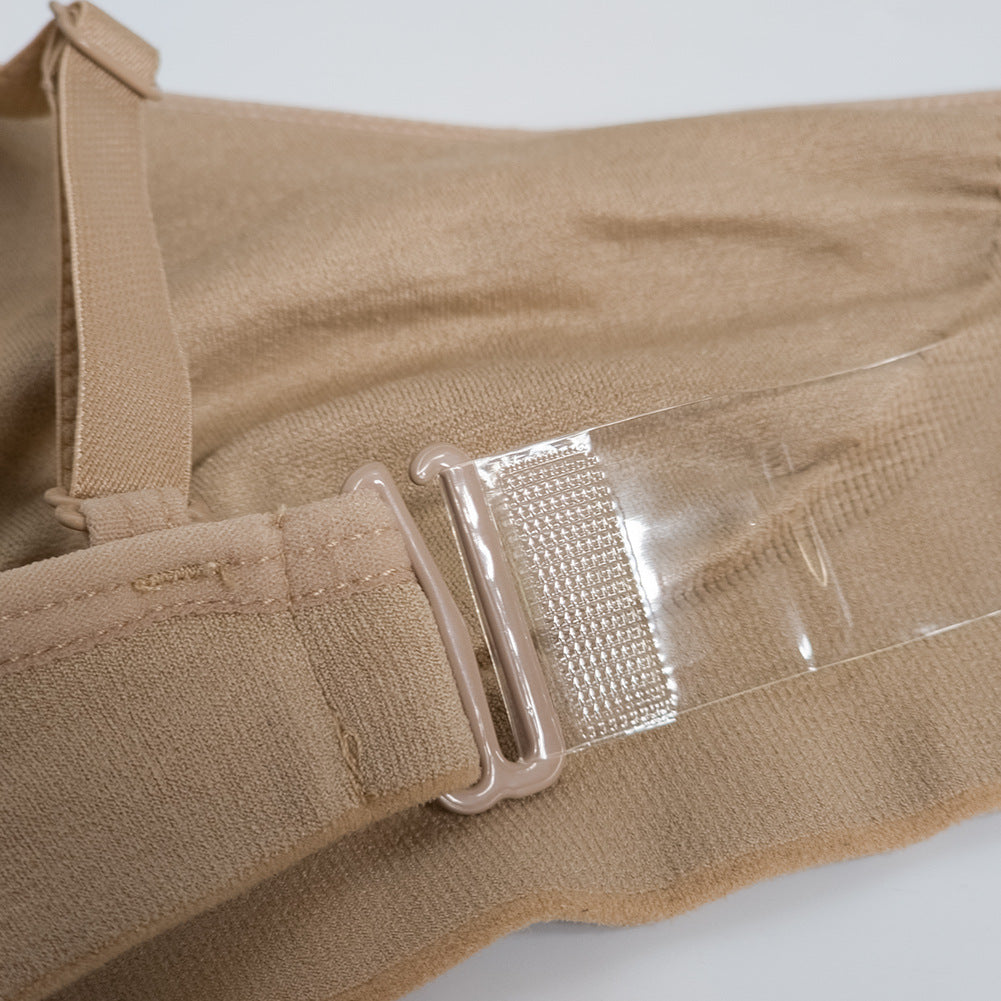 Tan fabric with a clear plastic buckle on a white background