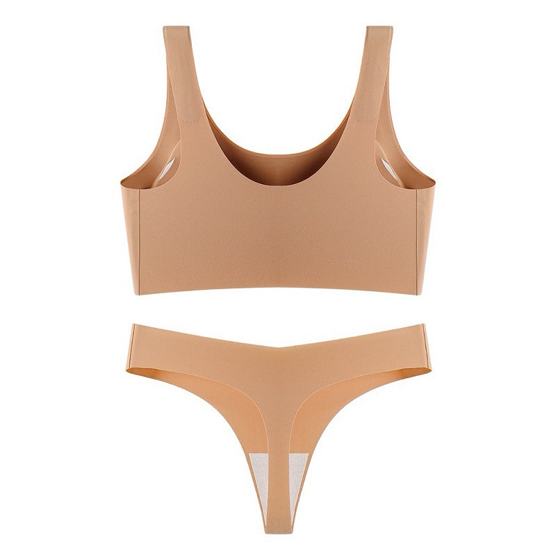 Beige bikini set on a white background