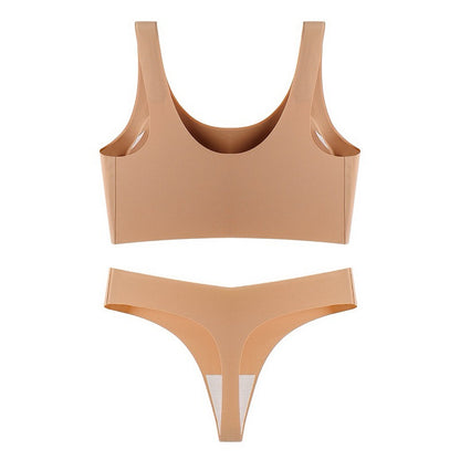 Beige bikini set on a white background