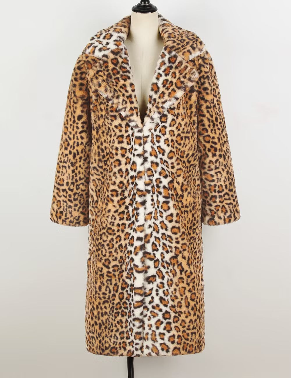 Leopard print coat on a mannequin against a white background