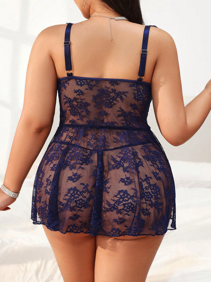 Navy blue lace babydoll on a white background