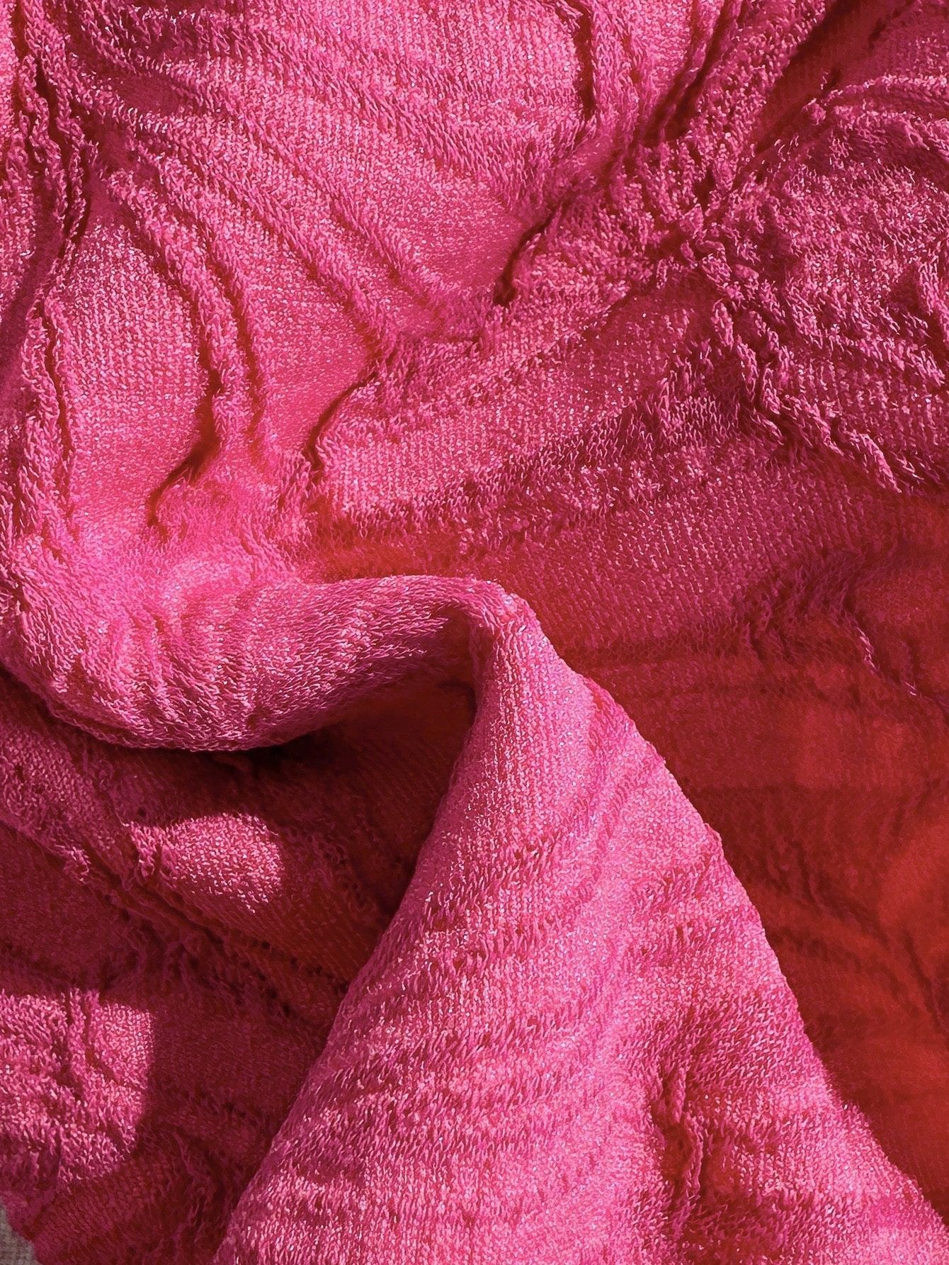 Close-up of textured pink fabric