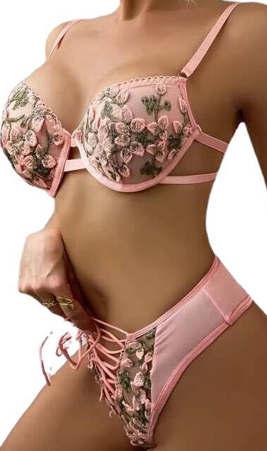 Pink floral bikini set on a white background