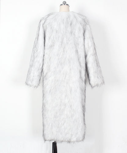White fur coat on a mannequin against a white background