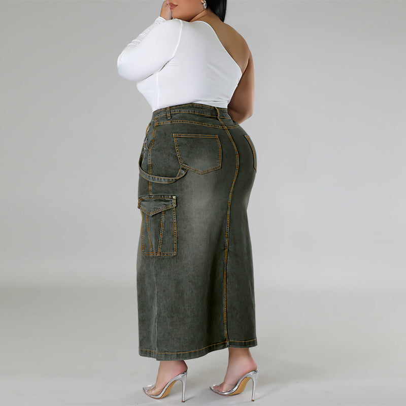 Person wearing a long denim skirt and white top on a plain background plus size denim decoration sleeveless split skirt women jeans in trend