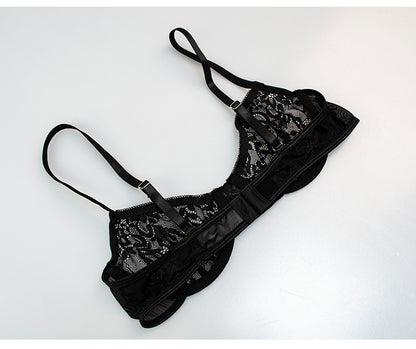 Black lace lingerie set on a white background