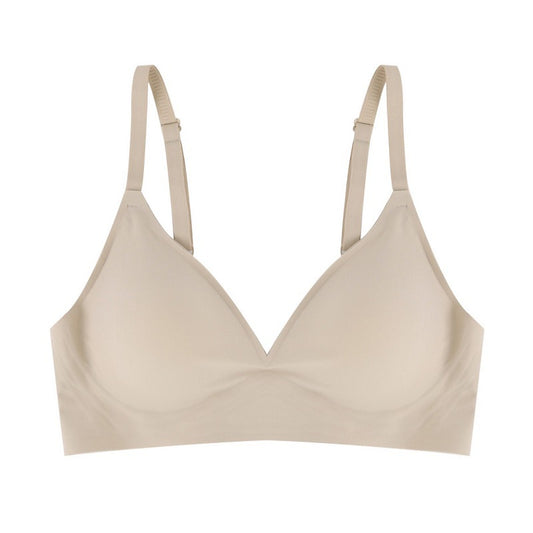 Beige bra on a white background