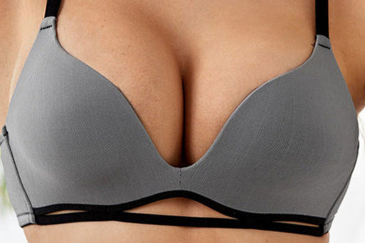 Plus size woman wearing French U-back bra with halter design