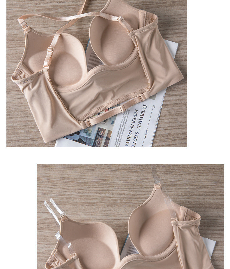 Beige bra on a wooden surface with newspaper underneath