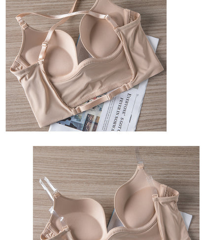Beige bra on a wooden surface with newspaper underneath