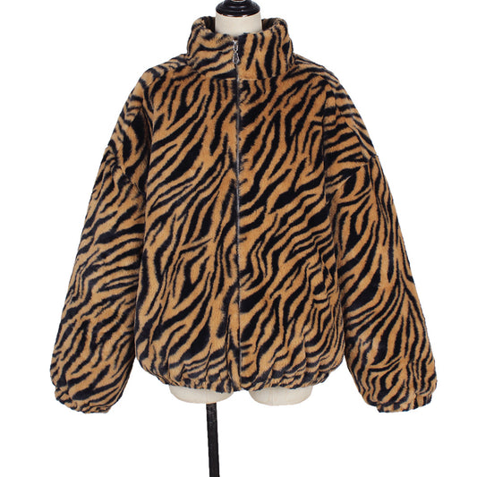 Zebra print jacket on a mannequin against a white background