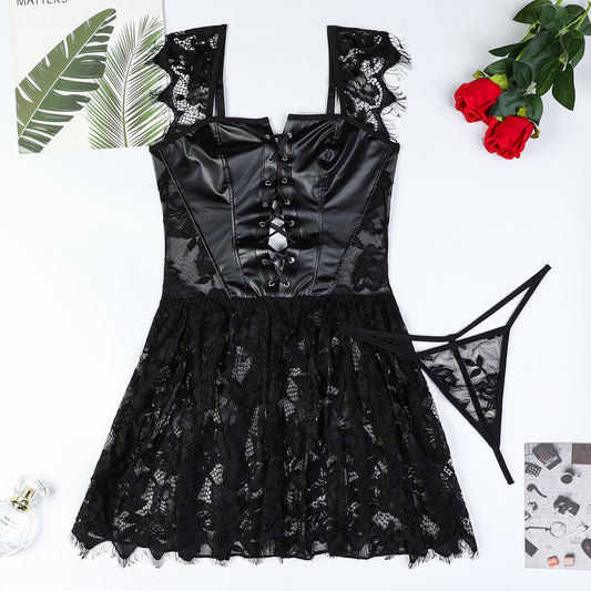 Plus size faux and patent leather motorcycle dress with lace stitching on curvy model