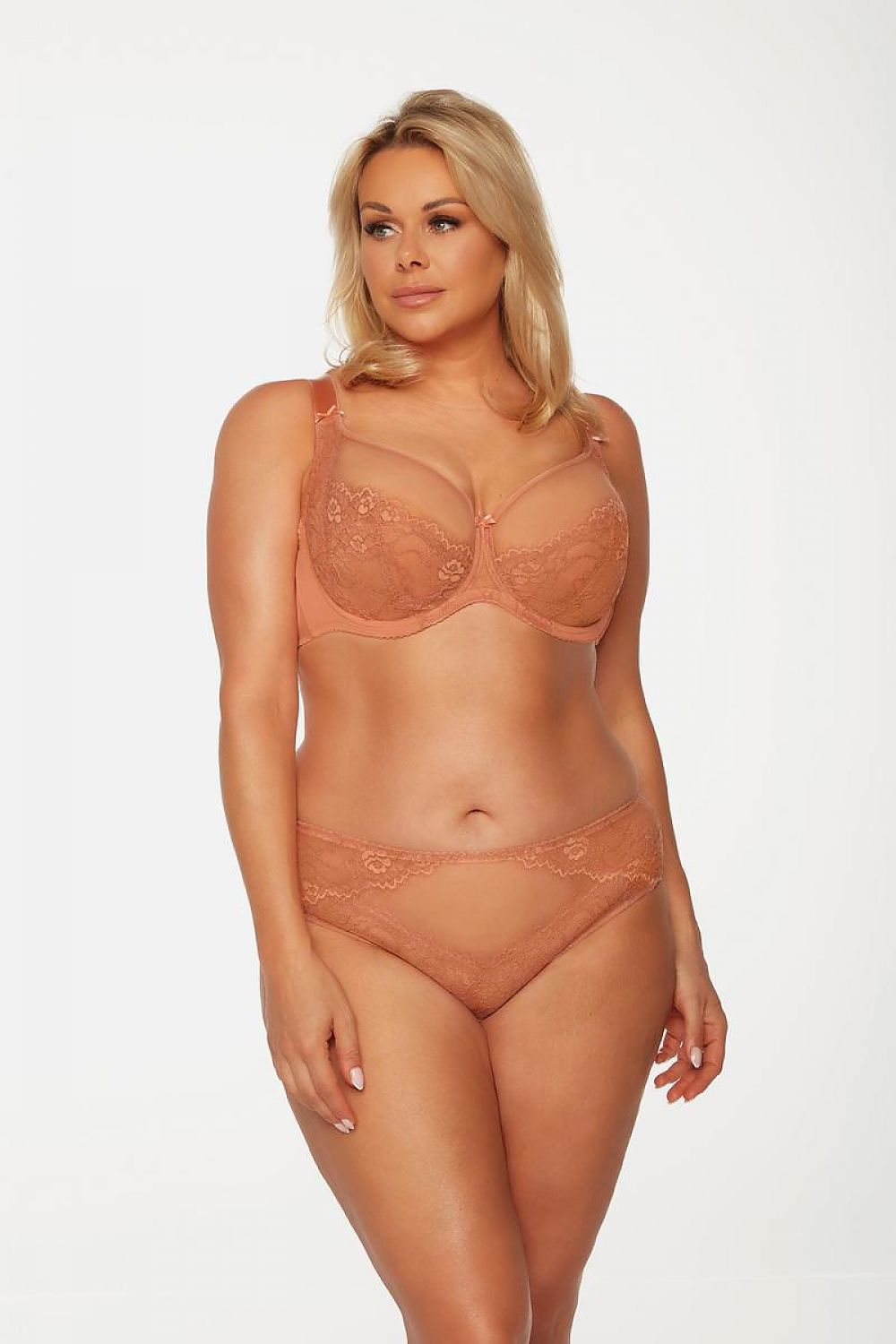 “Side view showing double reinforced sides and movable whalebones for full bust support”