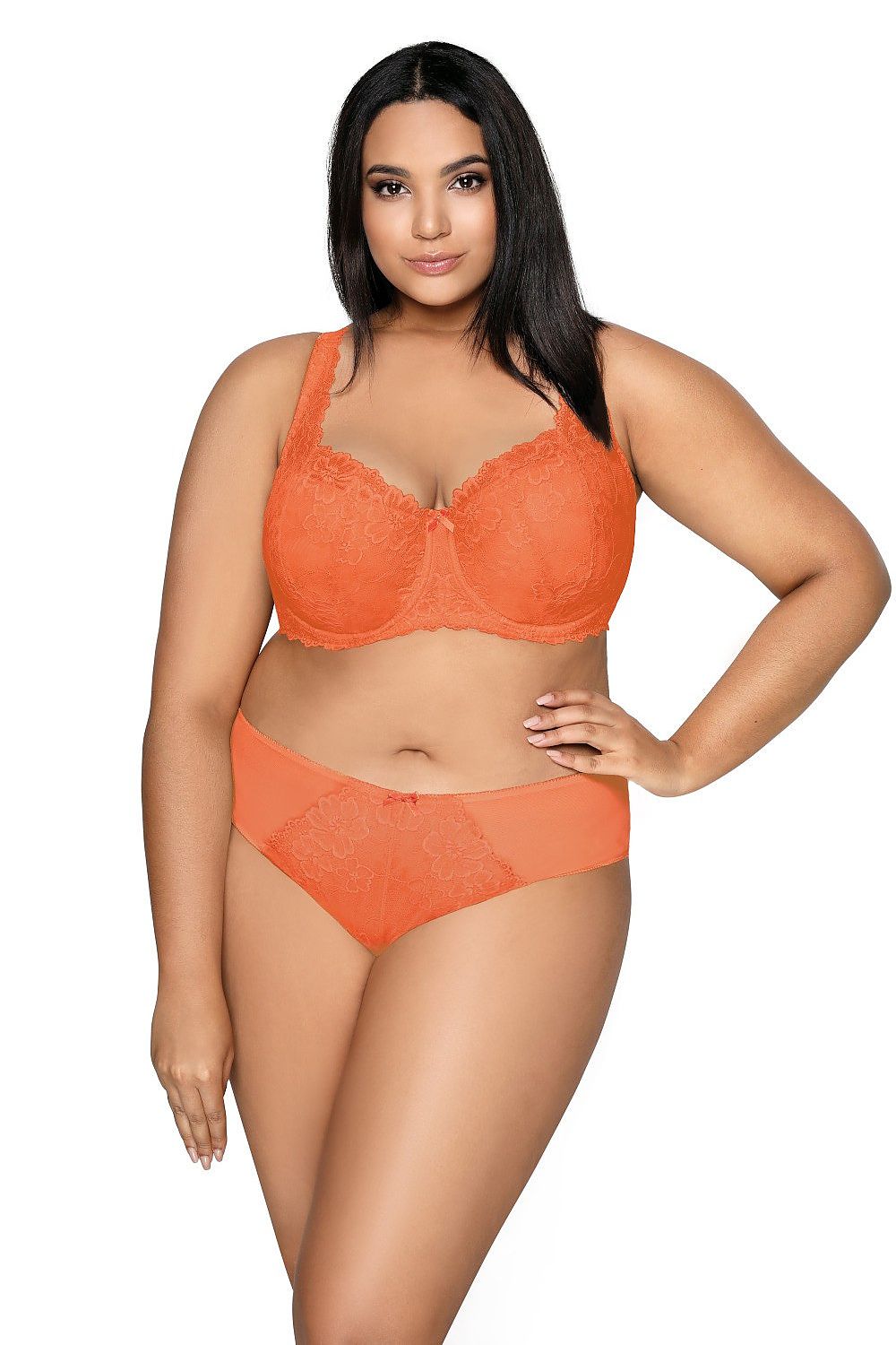“Front view of orange lace bra emphasizing cleavage and bust shape”