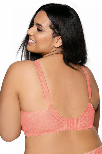 “Front view highlighting cleavage and shapely peach lace cups”