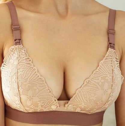 plus size wireless nursing bra with front clasp and click-clack straps laid flat
