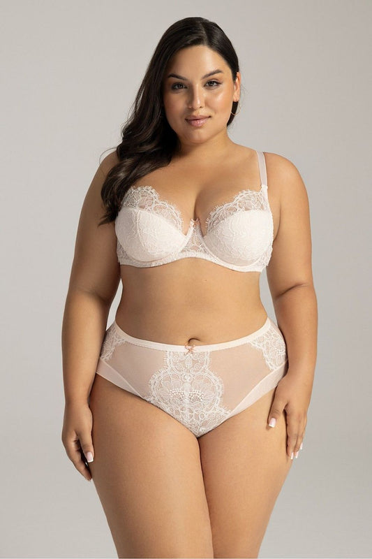 “Close-up of delicate double tulle back and decorative bow on plus size figs”