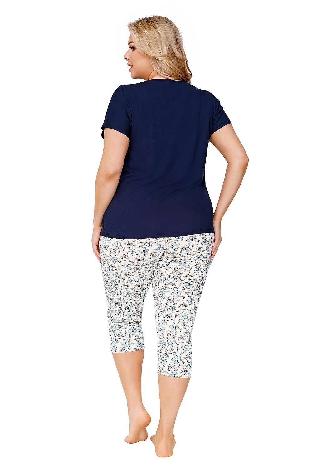 “Close-up of lace details on blouse neckline and sleeves in plus size pajamas”